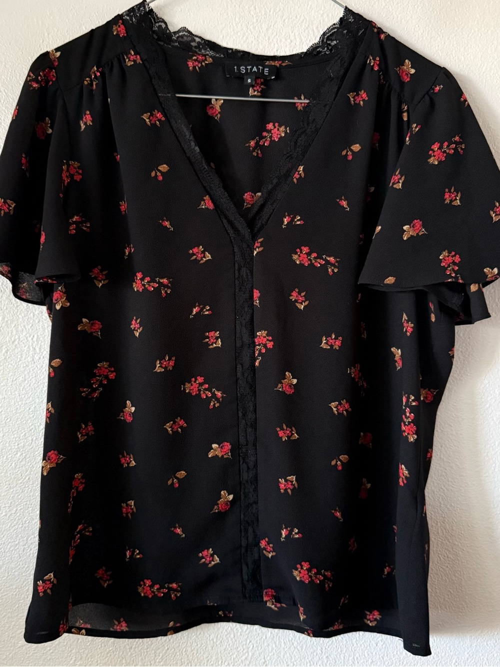 1. State Black Floral Lace-Trim V-Neck Flutter Sleeve Top
